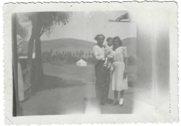 In the warm embrace of my mom and dad